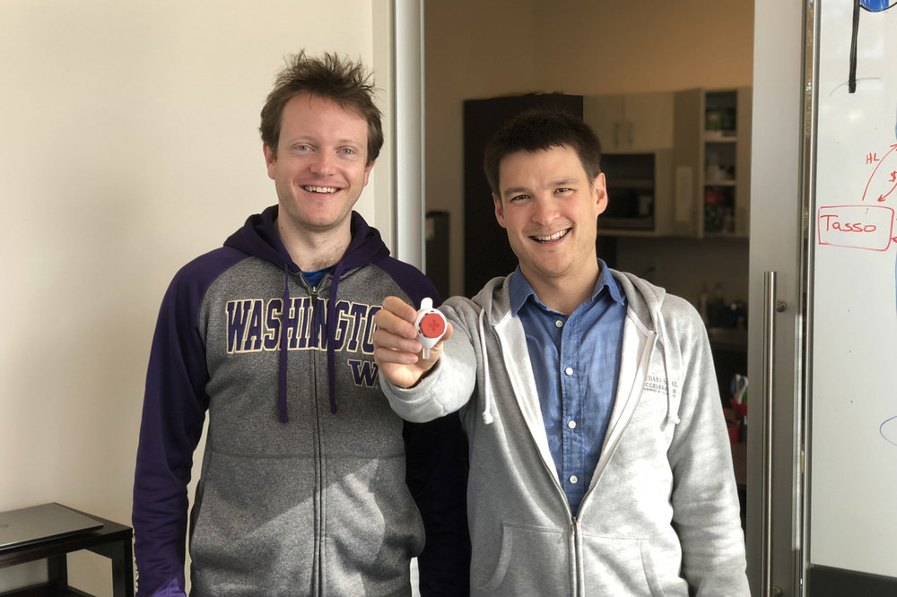 Tasso Inc. co-founders Erwin Berthier, left, and Ben Casavant are running trials to prove that their HemoLink device—which Dr. Casavant is holding—draws dependable blood samples.&nbsp;P